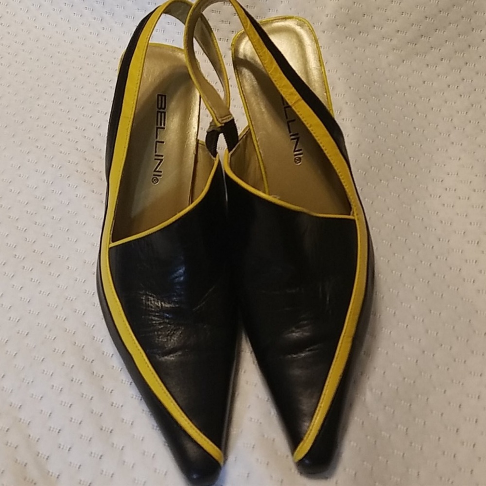 Unique leather black slingback heels with yellow trim. Made by Bellini